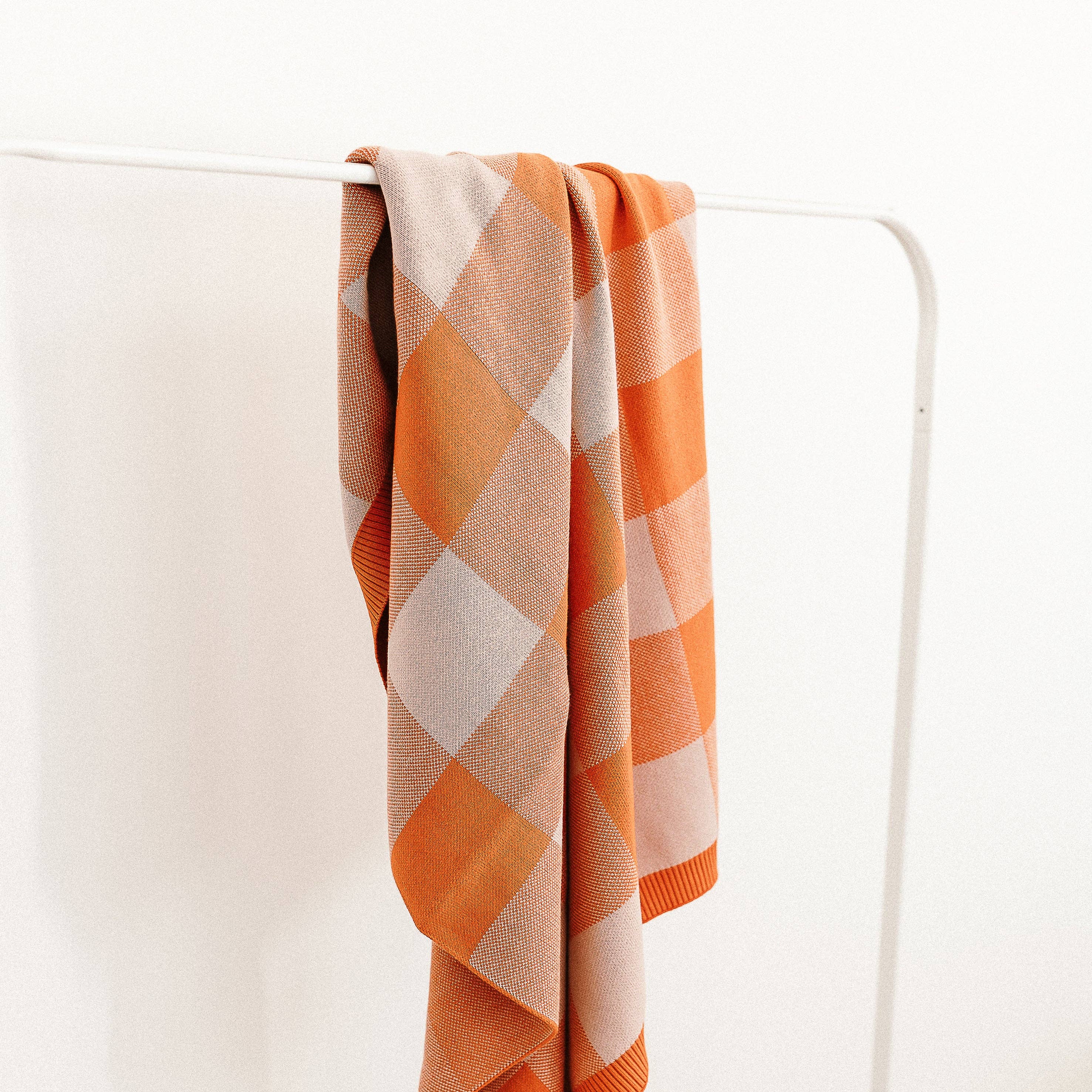 The Rest Organic Cotton Knit Blanket in Bubblegum Picnic — product detail shot
