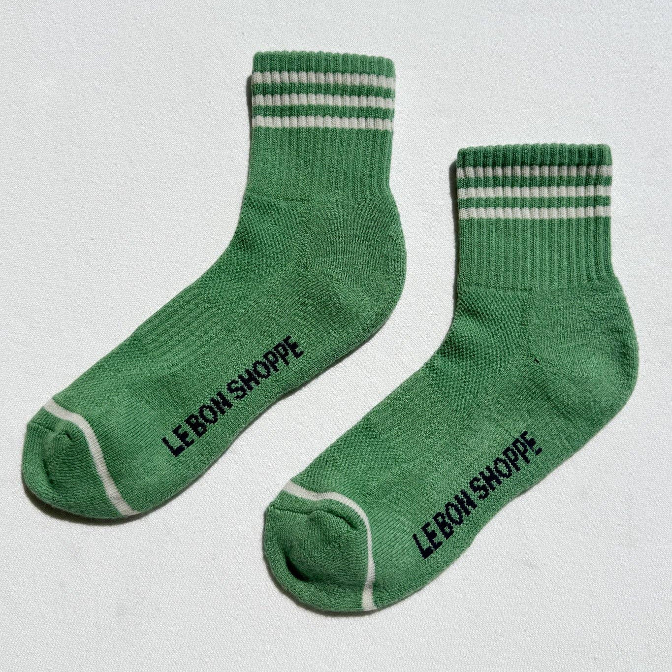 Close-up of the triple stripe trim on Le Bon Shoppe Girlfriend Socks in Avocado