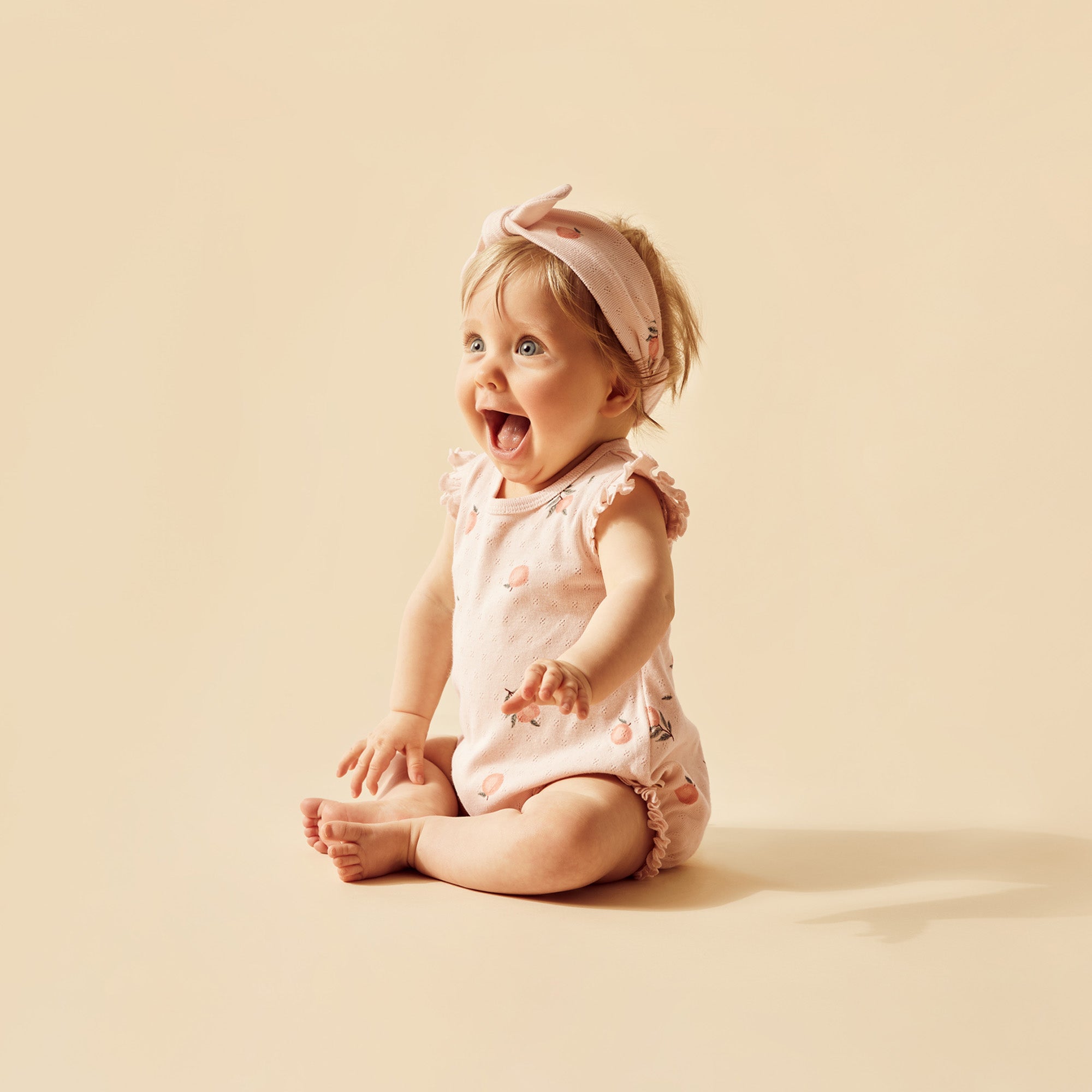 Wilson & Frenchy | Peaches Organic Pointelle Ruffle Growsuit