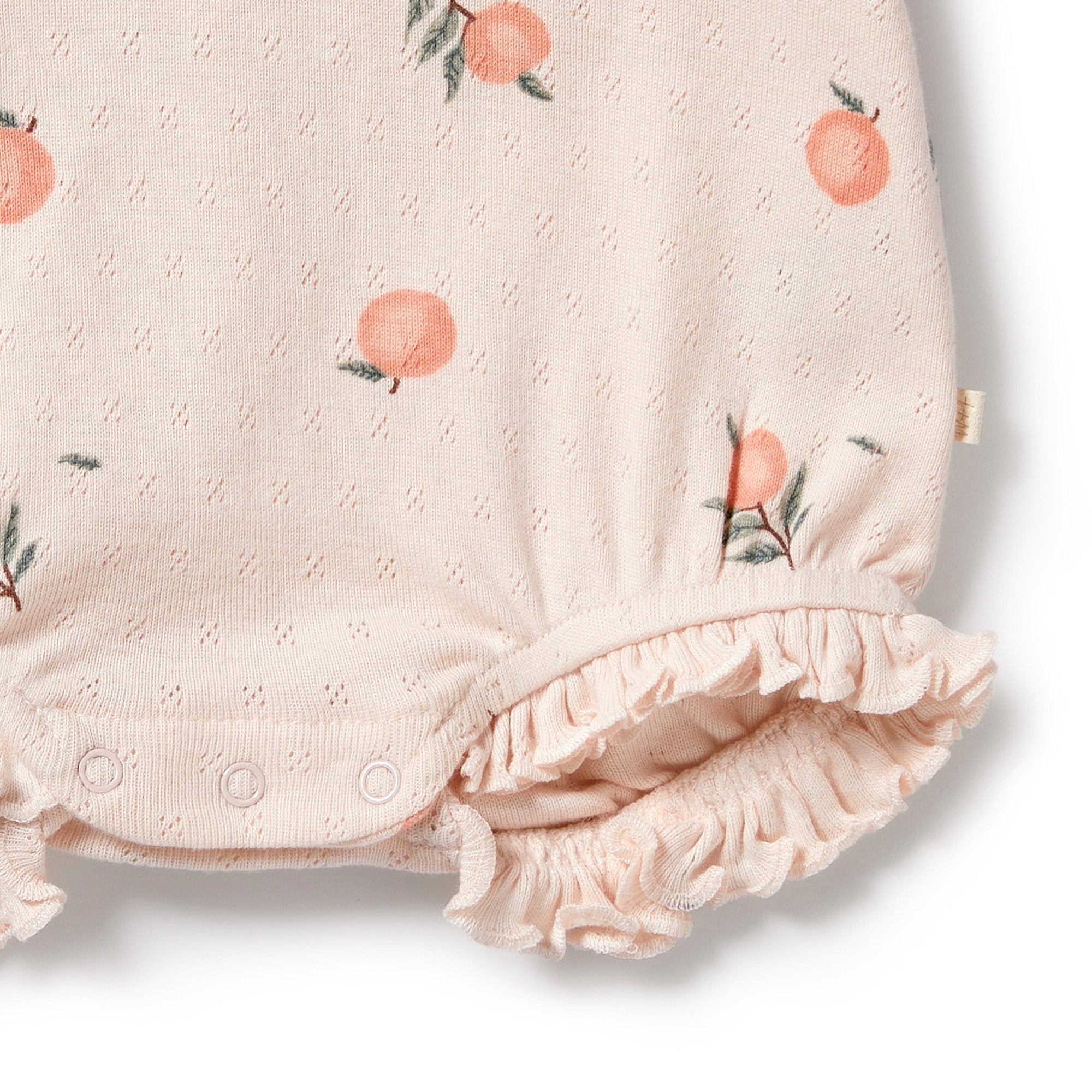 Wilson & Frenchy | Peaches Organic Pointelle Ruffle Growsuit