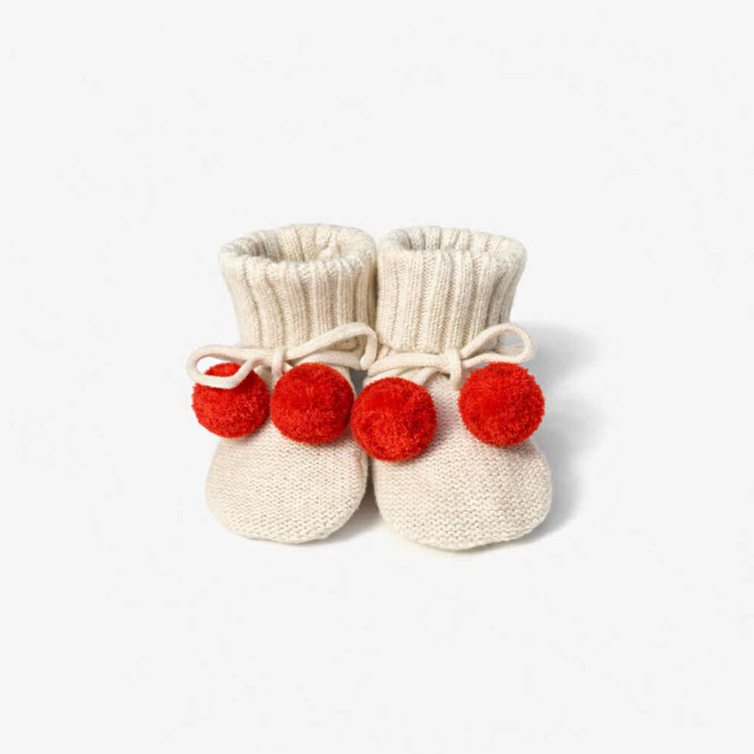 The Rest Organic Cotton Knit Booties in Oat Marle Tomato — front view flat lay