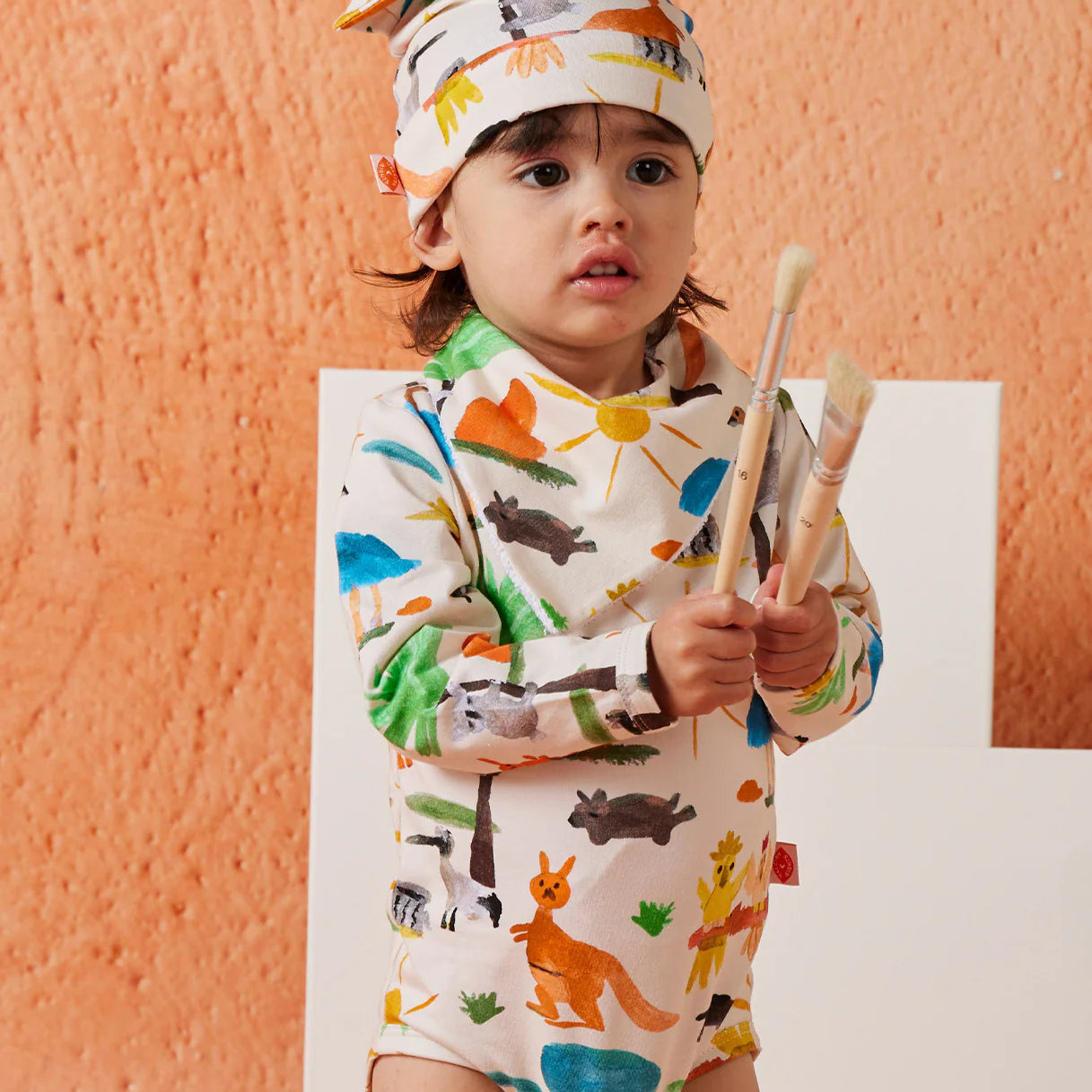 Halcyon Nights Baby Bib in Yo's Country — product detail shot
